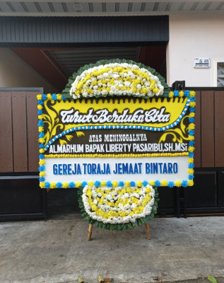Papan Bunga Duka di Triharjo
